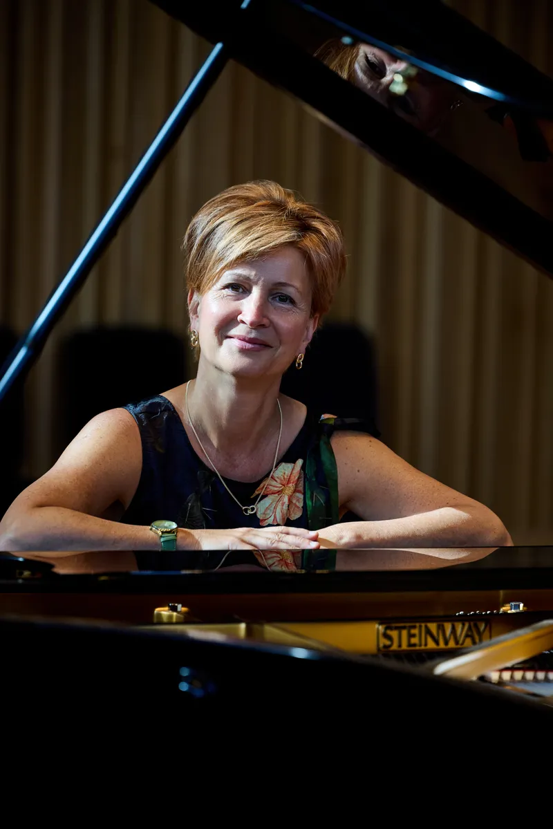 A pianist at a Steinway grand piano, Wells Cathedral School