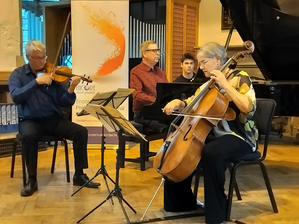 A faculty piano trio performing in Quilter Hall